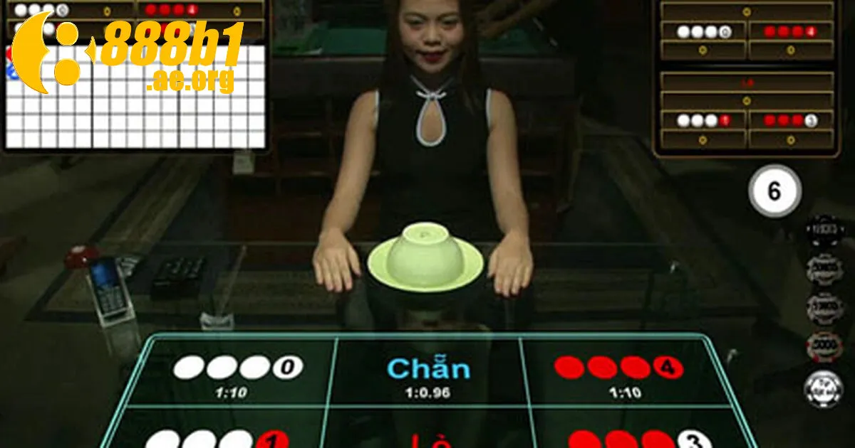 Dealer thao tác chia quân vị trong game Xóc Đĩa Online 888b trực tiếp từ sảnh Casino